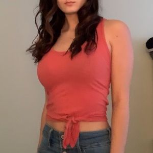 Salmon pink tank top with tie at the bottom crop